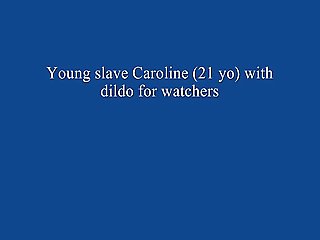 Young sex slave Caroline (21yo) with dildo