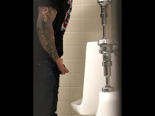 Tattooed Pisser with Nice Cock Notices His Voyeur Spying on Him.