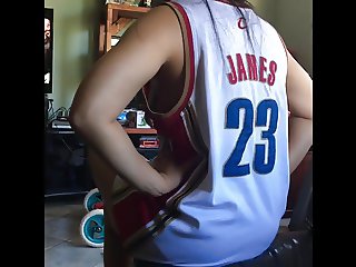 Sister wearing loose jersey at home